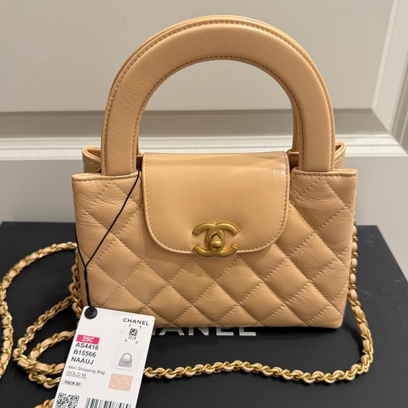 CHANEL Handbags - Chanel Beige Shiny Crinkled Quilted Leather Mini Shopping Bag NEW